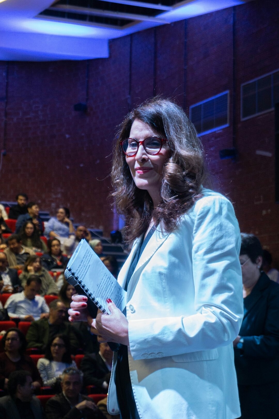 woman receiving literary award